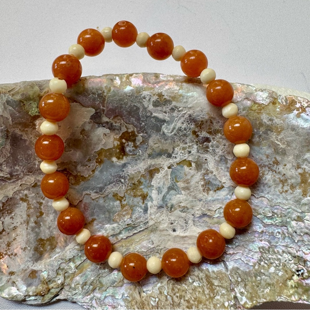 Vibrant Orange and Cream Beaded Bracelet